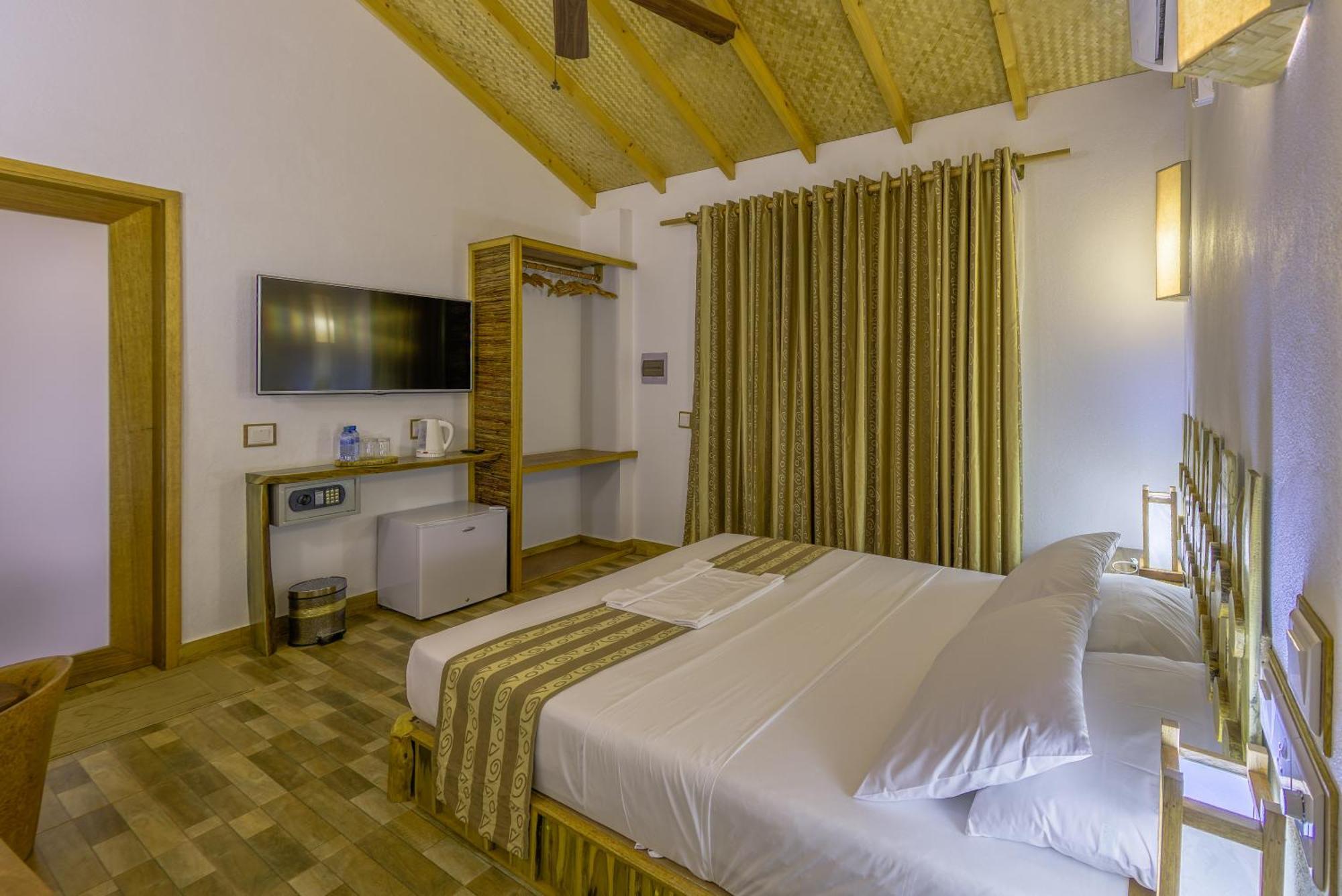 Ameera Maldives Диффуши Номер фото